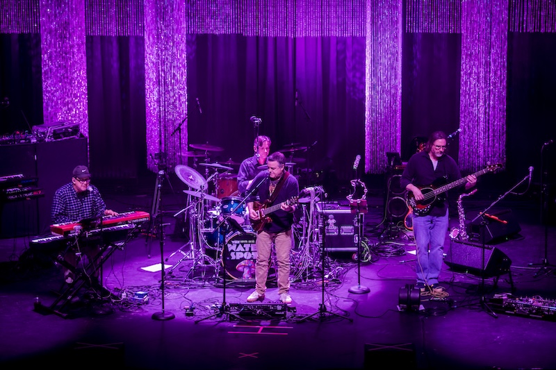 Noah performing with Water Spots